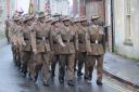 On parade: a contingent of Gurkhas march to the Warminster War Memorial for Remembrance Sunday.