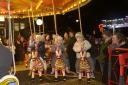 All the fun of the fair as young people enjoy the fairground attractions.