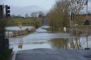 The River Avon has burst its banks, with flood waters on the B3015 at New Terrace and on the B3106 Lane from Staverton to Holt