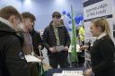 Emma Newton chats to students about apprenticeships with Dick Lovett at the careers fair at the Melksham Community Campus. Photo: Trevor Porter 50519-8
