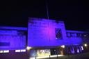 Light up the darkness: a coloured floodlight shines on Trowbridge Town Council’s Civic Centre to commemorate Holocaust Memorial Day.
