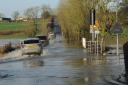 Despite five sets of road closure signs several motorists drove through to cross the flooded causeway at Staverton.
