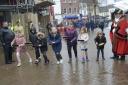 The children’s race gets underway in a wet and slippery Fore Street in Trowbridge.