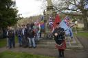 Piper Tony Beauchamp, along with military veterans at the Bradford on Avon War Memorial in Westbury Gardens prior to taking part in the Great Tommy Sleepout on Saturday.
