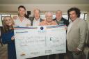Cheque presentation: Samantha Williams, Director of Pario Leisure and Wyn Williams. Director of Pario Leisure with Warren Gatland, Neville Southall, Mike England and Paul Sculthorpe.