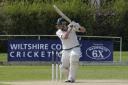 Neil Clark's century helped Potterne to victory over Bath to preserve their Premier One status