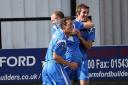 Mike Perrott (right) celebrates with Shaun Benison after the striker's goal in the 2-0 win at Hednesford on the opening day of the season (Picture: Richard Chappell)