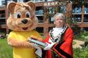 Trowbridge Ted and the town's mayor Cllr Graham Hill with the time capsule buried in the town park to celebrate the Queen's Platinum Jubilee. Photo: Trevor Porter 68076-9