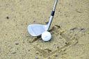 In wet sand, have the clubface square on to the target