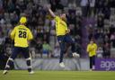 Hampshire Hawks' Liam Dawson (centre) celebrates taking the wicket of Surrey's Tom Curran during the Vitality Blast T20 match at The Ageas Bowl, Southampton