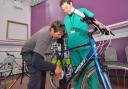 A doctor getting his bike checked. Picture: J Bewley/Sustrans