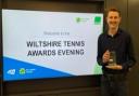 Will Knight clutches his Wiltshire Volunteer of the Year award at the Wiltshire Tennis awards evening.