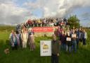 Campaigners objecting to McDonald's plans unveiled a banner at the Paxcroft Mead stone monument on Sunday.