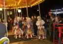 All the fun of the fair as young people enjoy the fairground attractions.