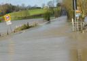Police have closed part of the B3105 at Staverton due to flooding