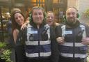Trowbridge street wardens Stephen and Sean Pink with Friday night revellers outside the Still Sisters gin distillery in Trowbridge.