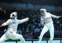 Sophie Williams, right, takes evasive action during her first-round defeat to Italy’s Irene Vecchi