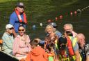Public figures such as MP Brian Mathew and Melksham's mayor Saffi Rabey enjoy a trip on the river.