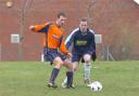 FC Northbridge's Jon Taylor and  Lavington's Delvin Keane battle for possession during Saturday's A and B Cup tie (24093/2)