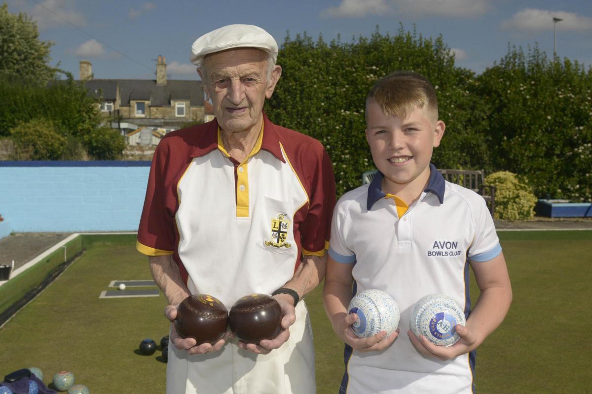 Tom White, of Box Bowls Club, with Alfie Holland, 13, of Avon Bowls Club,the oldest and the youngest players at the Spencer Moulton Bowls Club Gala Day in Bradford on Avon Photo: Trevor Porter 67633-2