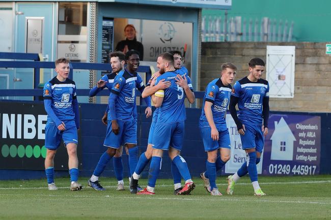 Chippenham Town loanee Harry Parsons celebrates one of his three goals against Dorking Wanderers in the Bluebirds’ crushing 4-1 win last weekend 		          Photo: Richard Chappell