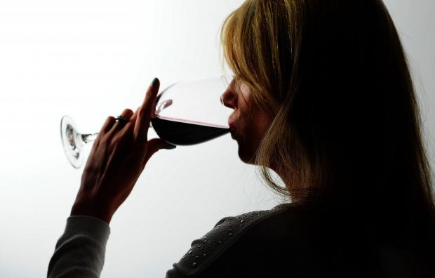 Wiltshire Times: A woman drinking red wine. Credit: PA