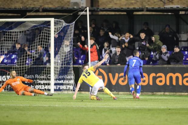 Chippenham Town striker Alefe Santos scores his second of the night against St Albans City on Tuesday Photo: Richard Chappell