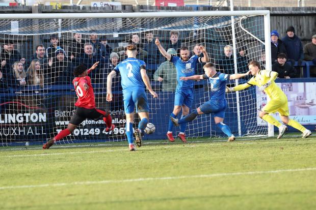 Chippenham Town’s Dan Griffiths pokes home in the 75th minute during the Bluebirds’ 1-1 draw with Eastbourne Borough on Saturday Photo: Richard Chappell