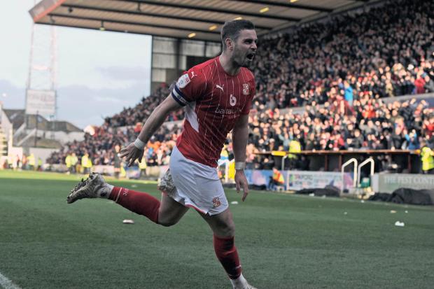 Former Swindon captain Conroy signs for League Two rivals