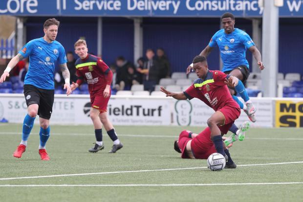 Swindon Town’s Mo Dabre in action for Chippenham Town