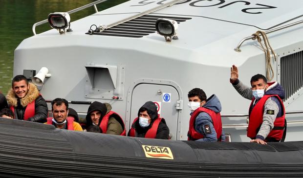 Wiltshire Times: Migrants being brought over to Dover in Kent (PA)