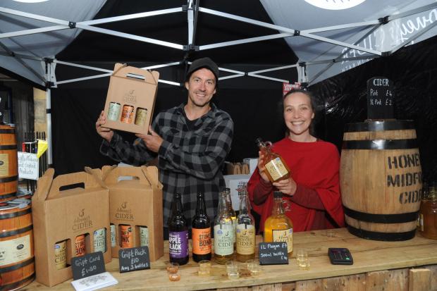 Cheers: Matt Brown and Kimberley Jones on the Honey’s Cider stall at Taste of Corsham. Photo: Trevor Porter 68109-03
