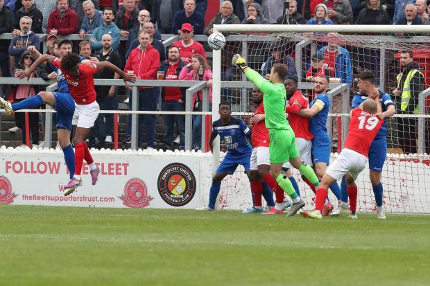 Will Henry punches clear from a corner during Ebbsfleet United v Chippenham Town in the National League South play-off semi-final last season        Photo: Richard Chappell