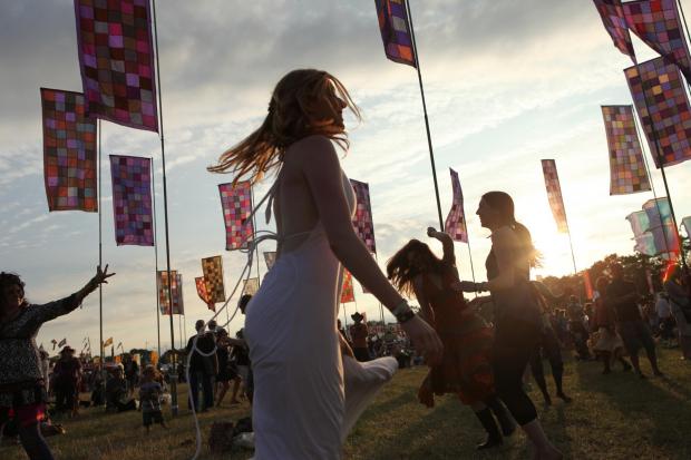 Wiltshire Times: A reveller enjoying WOMAD festival