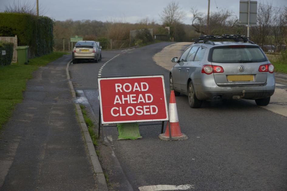Foolhardy drivers ignore flooding ‘road closed’ signs at Staverton 