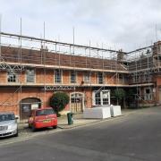 Scaffolding goes up around the Lopes Arms ahead of the redevelopment project
