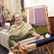 Judith Gilchrist, of Loomin Marvellous in Warminster, with her 16-inch wide Kromsky Rigid Heddle Loom Rigid at the Trowbridge Weavers Market. Photo: Trevor Porter 69340-5