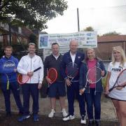 David Rawlinson (pictured in blue third from the right), President of the Lawn Tennis Association, visits members of the committee at Trowbridge Westbourne Tennis Club. Photo: Trevor Porter 69359-1