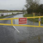 The B3106 between Staverton and Holt was closed as the River Avon burst its banks. Photo: Trevor Porter 69531-1