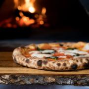 Here are five of the best pizza places in your area according to their Tripadvisor reviews. (Canva)