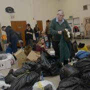 Richard Culverhous, president of  Studley Green Community Centre, busy sorting donated items for the  Turkey and Syrian Earthquake Crisis Appeal. Photo: Trevor Porter 69630-4