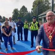 Warminster Mayor Cllr Phil Keeble officially opens the town's new tennis courts.