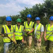 Wildlife officer Howard Yardy (centre) with volunteers Ian Sankey, Dave Maloney, Mark Greenwood and Rachel Whyte in front some of the newly planted trees at Double Bridge.