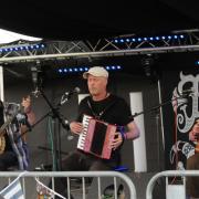 Harp & A Monkey, the award winning modern folk trio, on the Main Stage on Saturday.