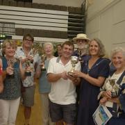 Bradford on Avon Mayor Katie Vigar presents the cups to the winners with Neville Day (fore) with the Avonfield Cup for most points in the fruit and vegetable classes.