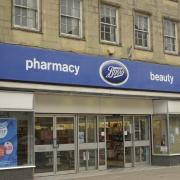 The Boots pharmacy store in Market Place, Warminster, has struggled to cope with people queuing to collect medications.