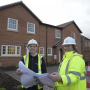 Paul Walsh, Selwood Housing group development director, with project manager Nikki Townshend with plans of regeneration of a derelict site in a historic conservation area. Photo: Trevor Porter 70424-3