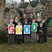 West Ashton CofE Primary School headteacher Alex Blake-Thwaite celebrating with pupils the 'Good' Ofsted rating.