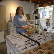 Jo Gomme with her Onyx eggs and crystals in the 15th century Hall House in Church Street, Trowbridge.