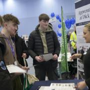 Emma Newton chats to students about apprenticeships with Dick Lovett at the careers fair at the Melksham Community Campus. Photo: Trevor Porter 50519-8